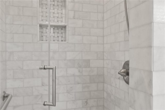 room details with a tile shower