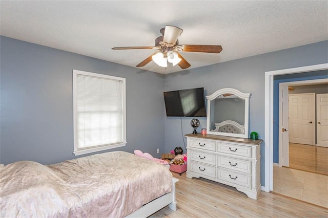 5990 Z Hwy, Edgerton, MO 64444 - bedroom featuring light wood-style floors and ceiling fan