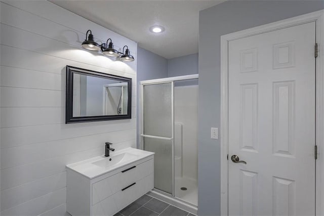 5990 Z Hwy, Edgerton, MO 64444 - bathroom featuring a stall shower, vanity, and tile patterned floors