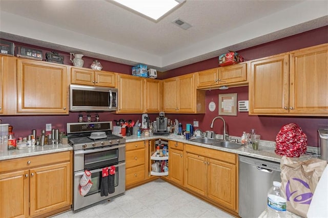 5990 Z Hwy, Edgerton, MO 64444 - kitchen with appliances with stainless steel finishes, a sink, light countertops, and light floors