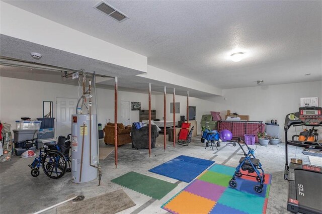 5990 Z Hwy, Edgerton, MO 64444 - finished below grade area featuring water heater and a textured ceiling