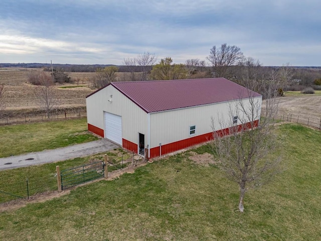 5990 Z Hwy, Edgerton, MO 64444 - view of pole building featuring dirt driveway and a view of rural / pastoral area