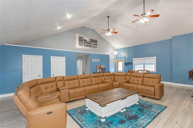5990 Z Hwy, Edgerton, MO 64444 - living area with baseboards, ceiling fan, light wood-style flooring, and high vaulted ceiling
