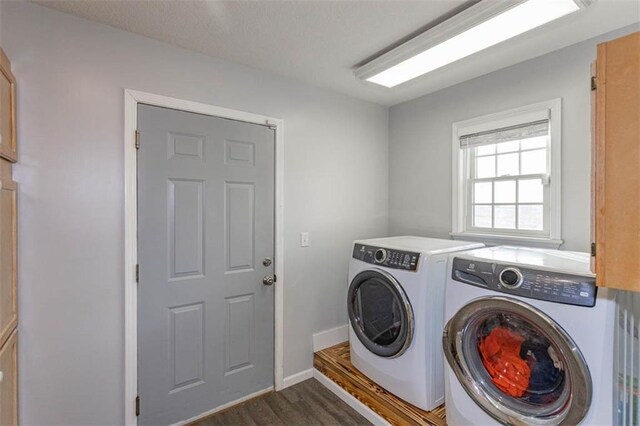 5990 Z Hwy, Edgerton, MO 64444 - laundry room featuring independent washer and dryer, dark wood-type flooring, and baseboards