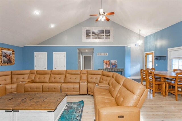 5990 Z Hwy, Edgerton, MO 64444 - living room with high vaulted ceiling, light wood-type flooring, ceiling fan, and baseboards