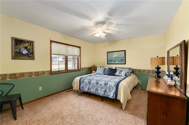 bedroom with carpet, ceiling fan, and baseboards