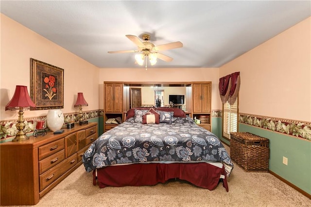 bedroom featuring ceiling fan and carpet floors