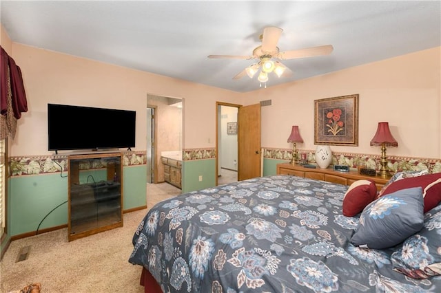 bedroom with ceiling fan, carpet floors, and visible vents