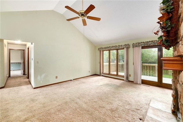 3824 SW Windemere Dr, Lees Summit, MO 64082 - unfurnished living room with high vaulted ceiling, carpet floors, ceiling fan, and baseboards