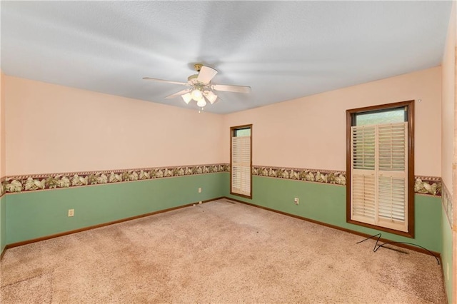 3824 SW Windemere Dr, Lees Summit, MO 64082 - empty room with carpet, a ceiling fan, and baseboards
