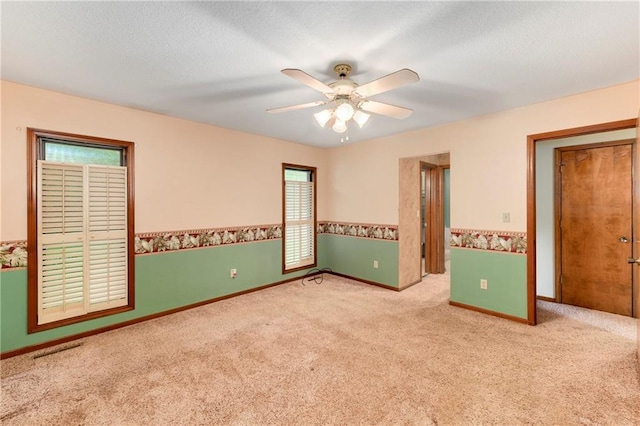 3824 SW Windemere Dr, Lees Summit, MO 64082 - unfurnished room featuring carpet, ceiling fan, and baseboards