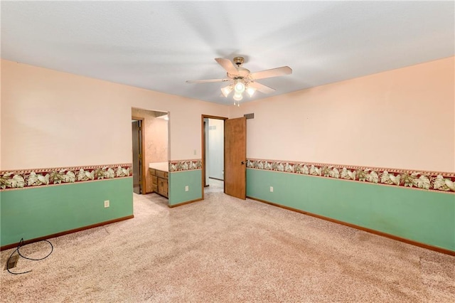 3824 SW Windemere Dr, Lees Summit, MO 64082 - empty room featuring carpet floors, ceiling fan, and baseboards