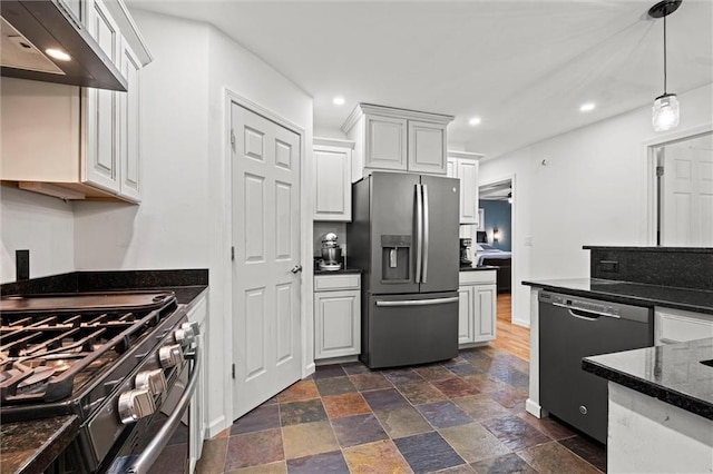 kitchen with recessed lighting, stainless steel appliances, white cabinetry, range hood, and decorative light fixtures