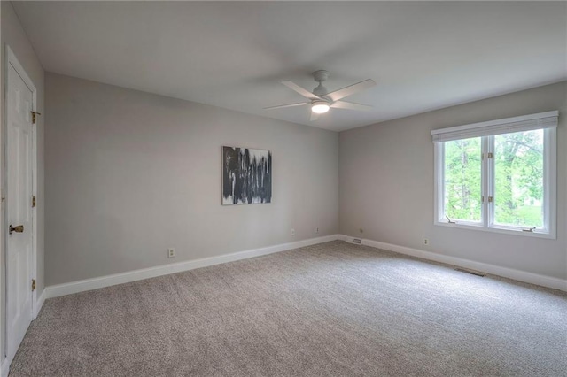12016 Ballentine St, Overland Park, KS 66213 - unfurnished room featuring carpet, baseboards, and ceiling fan
