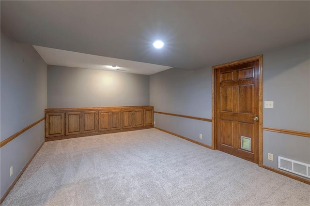 12016 Ballentine St, Overland Park, KS 66213 - empty room featuring light colored carpet, baseboards, and recessed lighting
