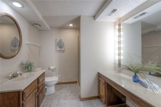 12016 Ballentine St, Overland Park, KS 66213 - full bath featuring toilet, a textured ceiling, baseboards, a shower stall, and two vanities