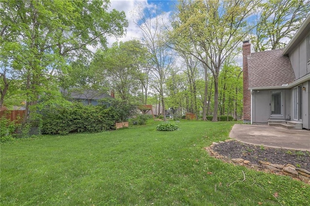 12016 Ballentine St, Overland Park, KS 66213 - view of yard with a patio