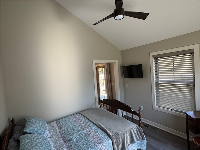 bedroom with a ceiling fan, dark wood-style floors, baseboards, visible vents, and lofted ceiling