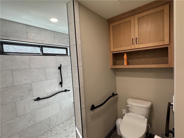 full bathroom featuring toilet and walk in shower