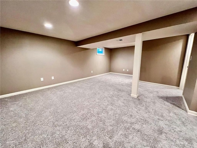 finished below grade area featuring recessed lighting, carpet, and baseboards