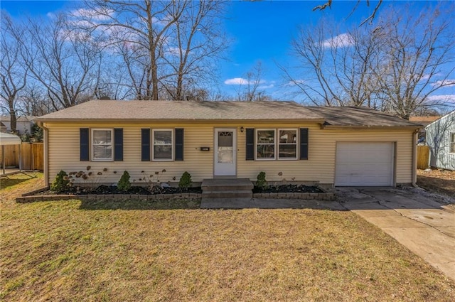 single story home with an attached garage, driveway, fence, and a front lawn