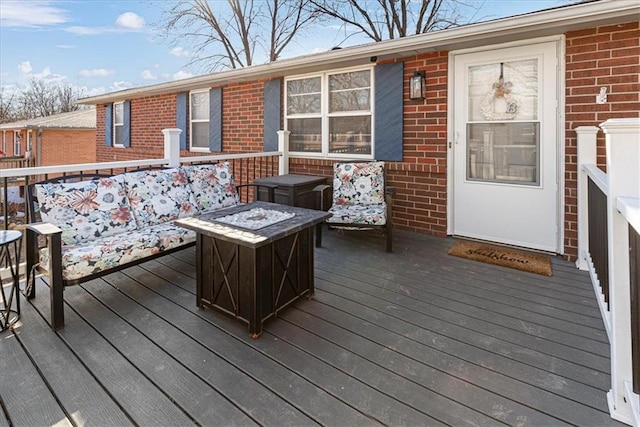 deck featuring a fire pit