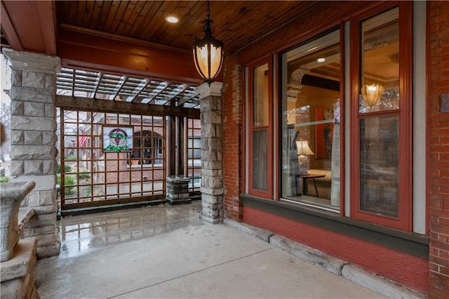 property entrance with brick siding