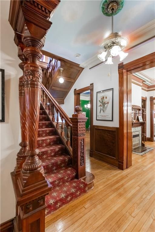 stairs with hardwood / wood-style flooring