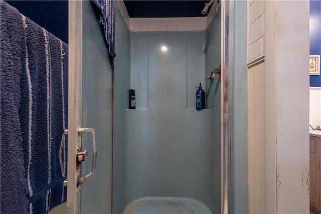 bathroom featuring a shower stall