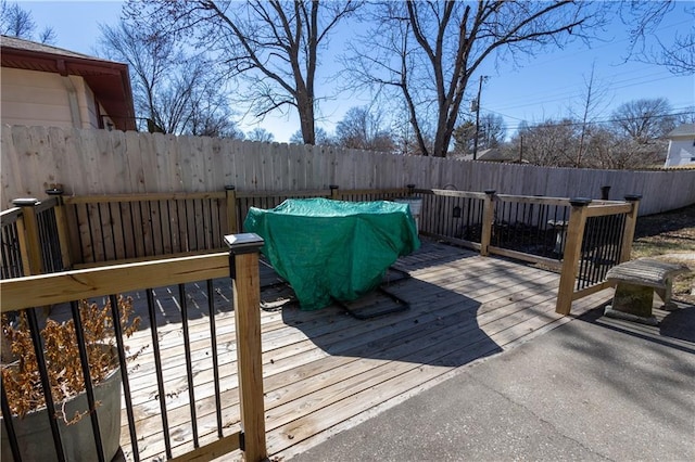 deck featuring a fenced backyard