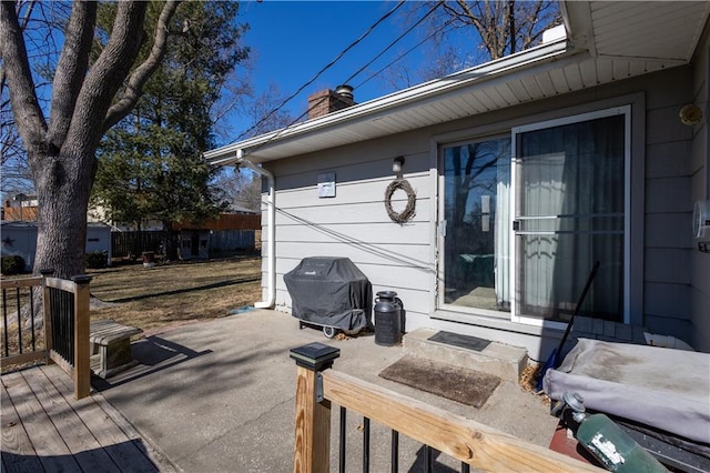 view of patio / terrace with area for grilling and a wooden deck