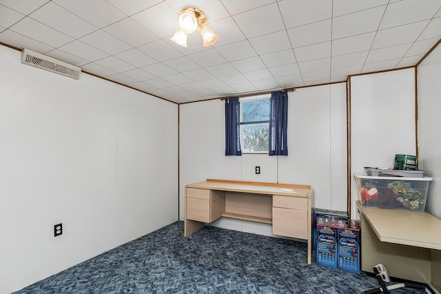 carpeted home office with visible vents