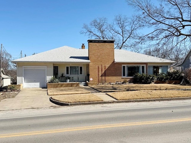 single story home featuring a garage, a chimney, concrete driveway, and roof with shingles