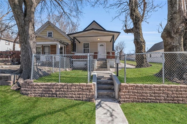 shotgun-style home with a fenced front yard, covered porch, a front lawn, and a gate