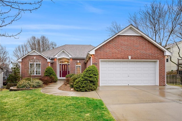 ranch-style home with a garage, brick siding, concrete driveway, roof with shingles, and a front yard