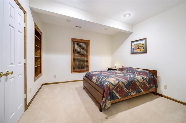 bedroom featuring recessed lighting, light colored carpet, visible vents, and baseboards