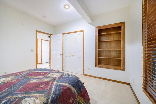 bedroom featuring recessed lighting, carpet flooring, beamed ceiling, and baseboards