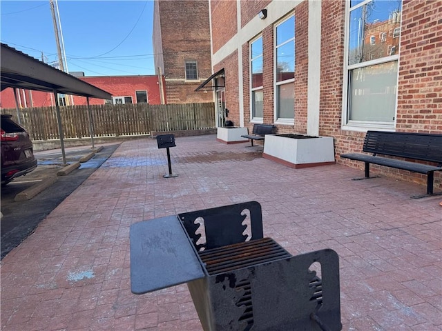 view of patio / terrace with fence