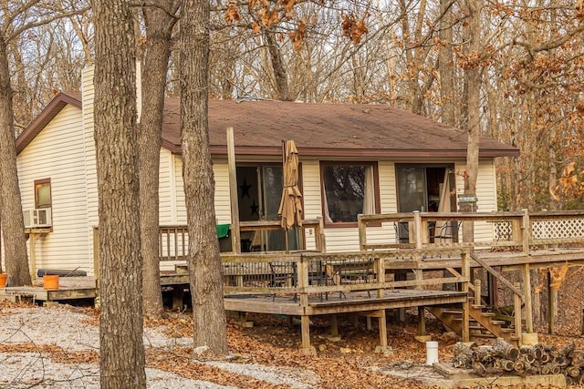 rear view of house with a deck