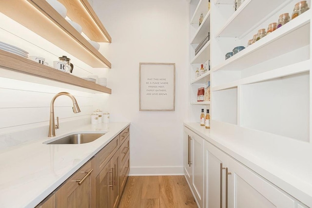 pantry featuring a sink