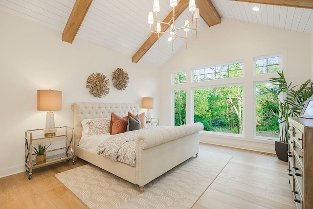 bedroom featuring high vaulted ceiling, a chandelier, light wood-type flooring, beamed ceiling, and baseboards