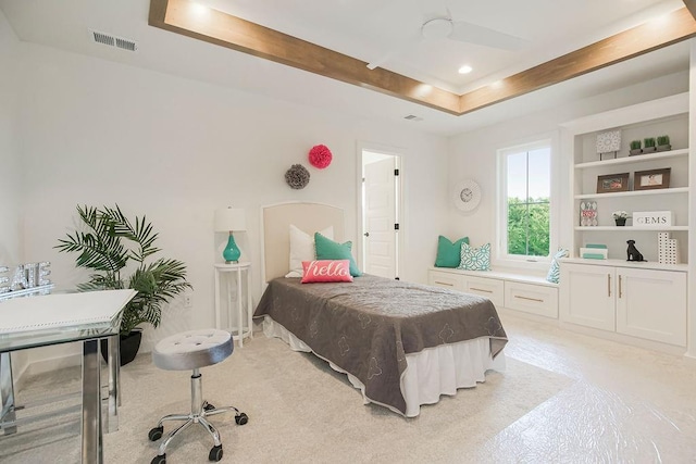 bedroom with recessed lighting, a raised ceiling, and visible vents