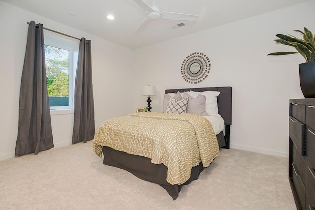 bedroom with baseboards, visible vents, light colored carpet, ceiling fan, and recessed lighting