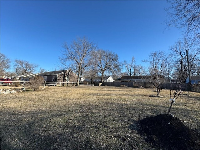 view of yard featuring fence