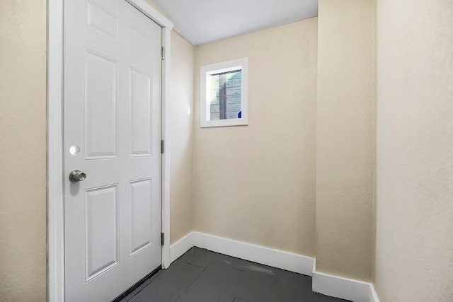 doorway with baseboards