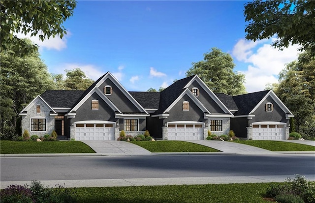 view of front of house featuring a garage, stone siding, and driveway