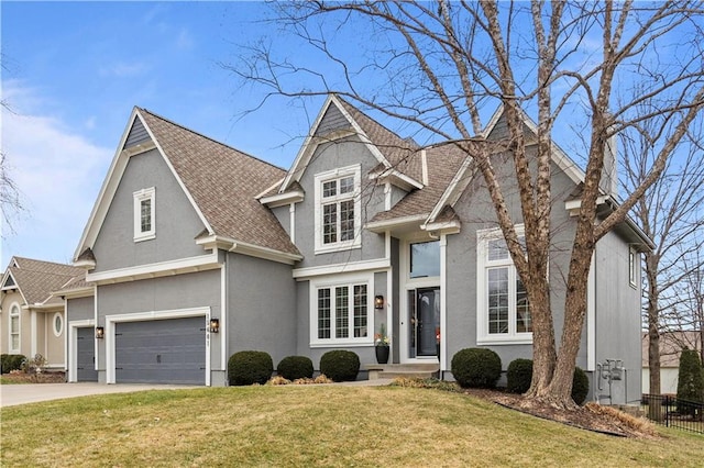 traditional-style house with stucco siding, an attached garage, fence, driveway, and a front lawn