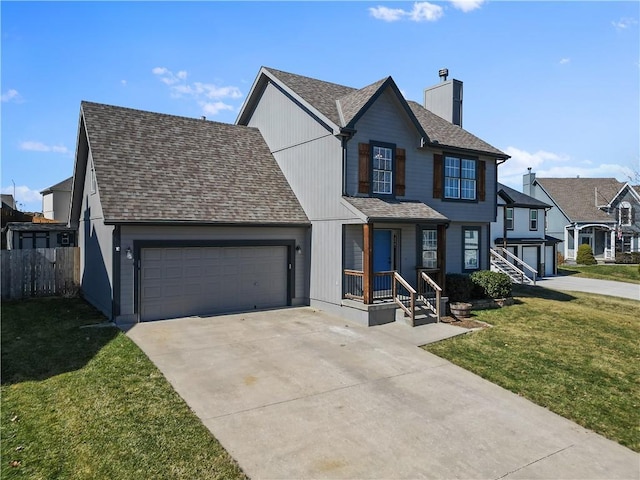 view of front of house featuring a shingled roof, a front yard, a chimney, driveway, and an attached garage