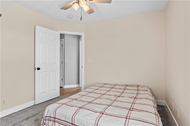 bedroom with carpet, baseboards, and ceiling fan