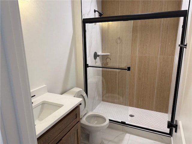 bathroom with a stall shower, marble finish floor, and toilet